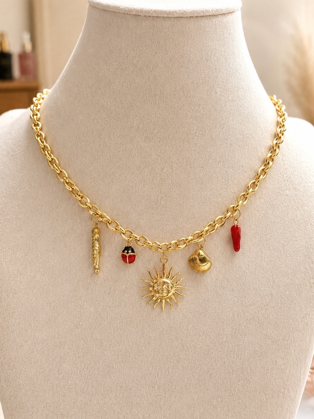 Gold Charm Necklace with Sun and Red Accents steel 316L - Picture 1 of 3